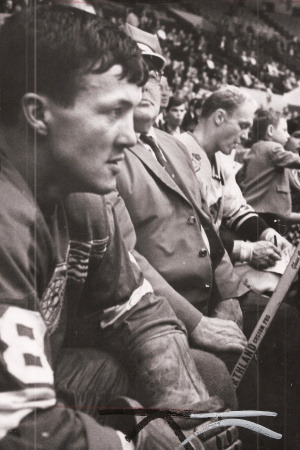 Bryan "Bugsy" Watson in the penalty box with Bobby Hull, signing an autograph